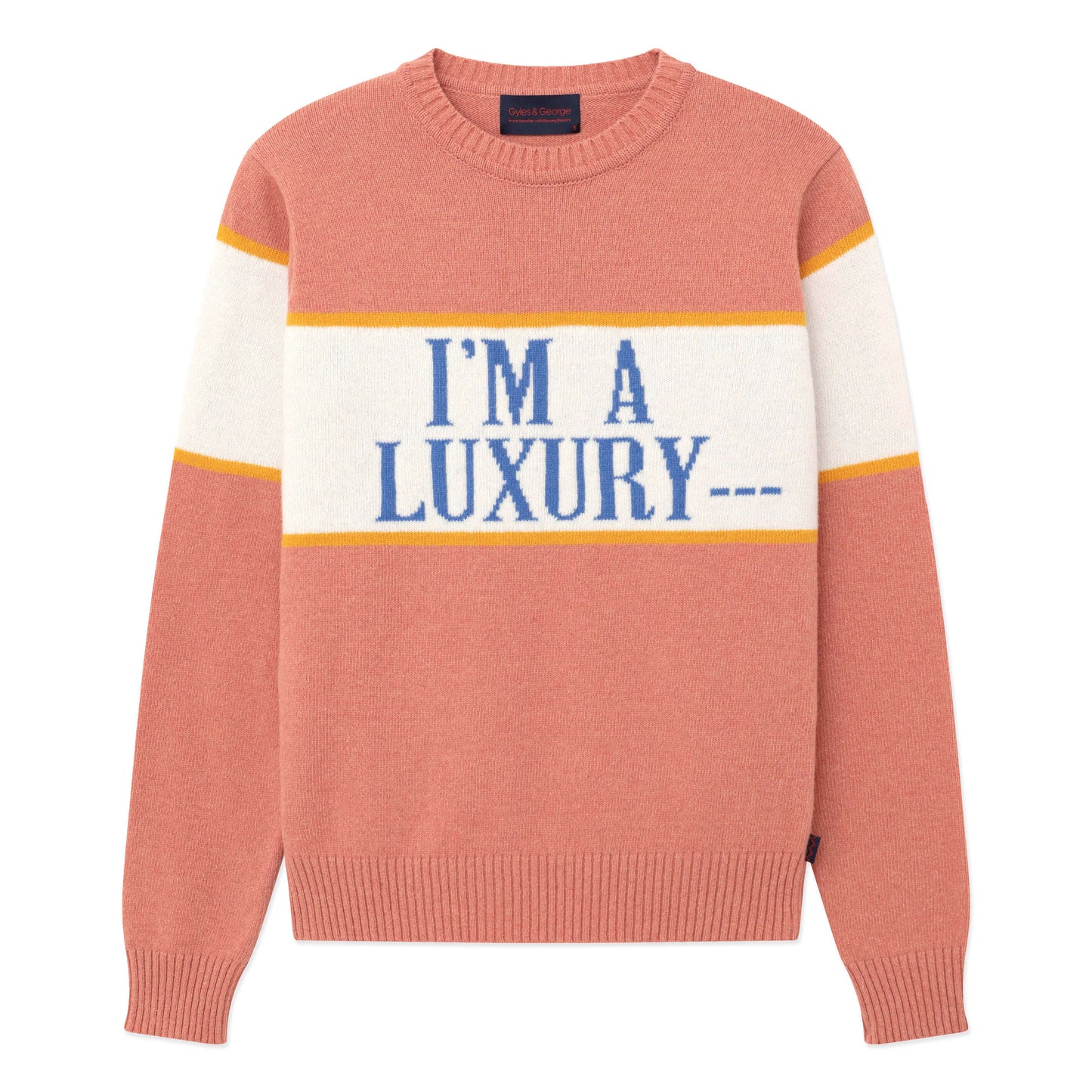 Pink sweater with "I'm a Luxury ---" across the front.