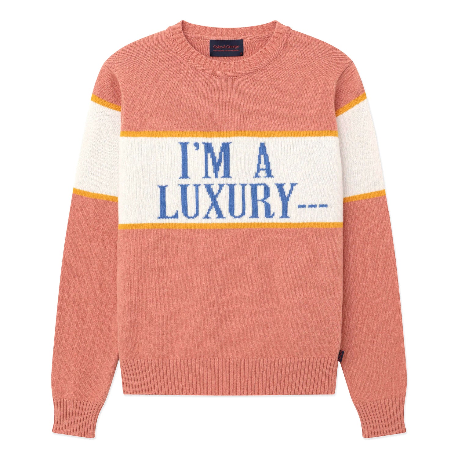 Pink sweater with "I'm a Luxury ---" across the front.