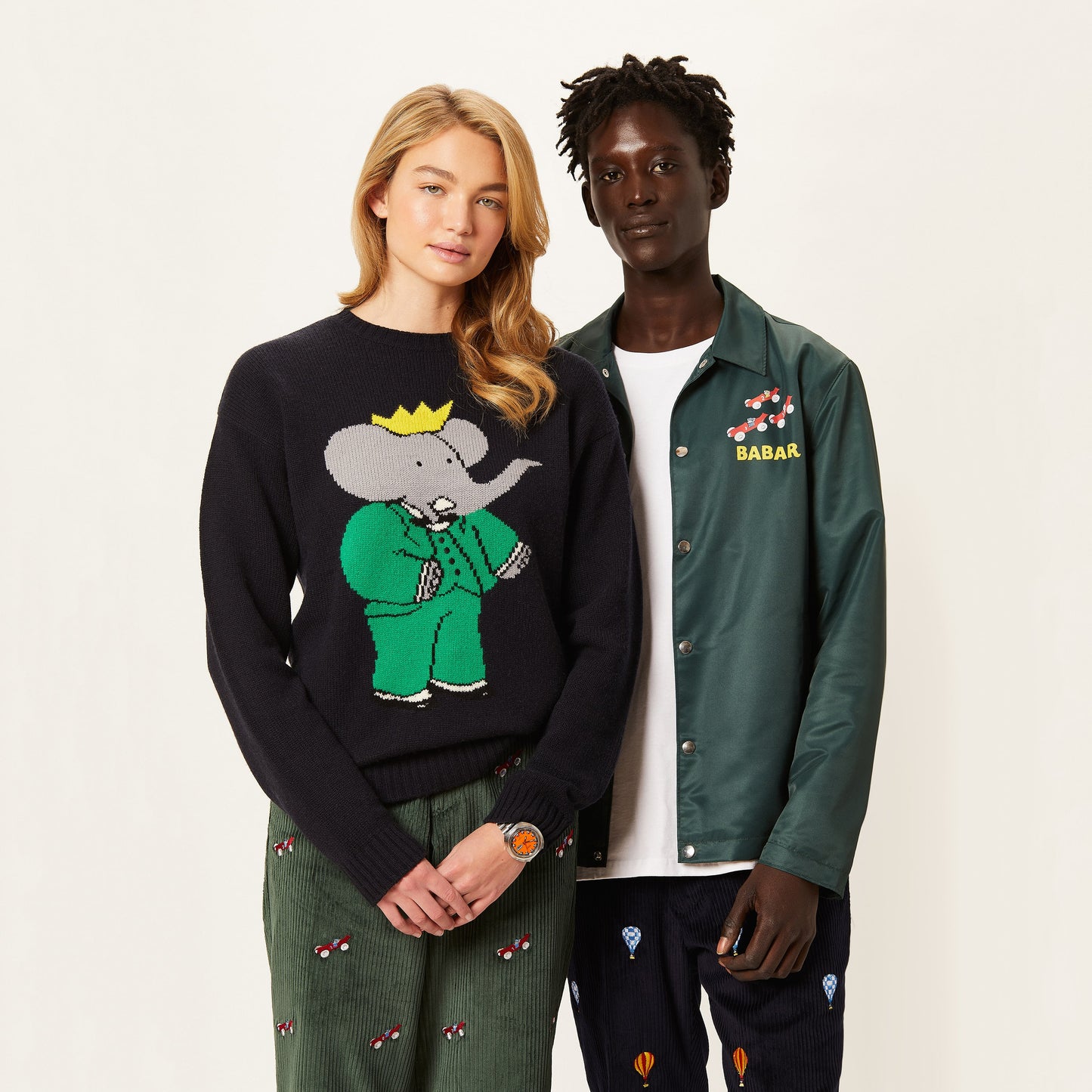 Models wearing the Rowing Blazers x Babar collection.