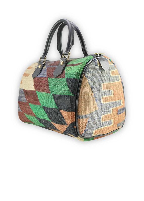 One of a kind mini duffle bag handmade from Turkish carpets.