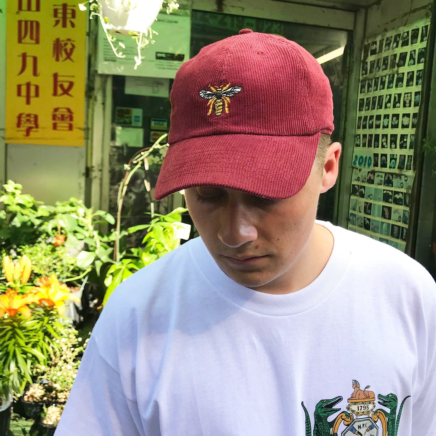 Male model wearing the Burgundy Drone Cap.