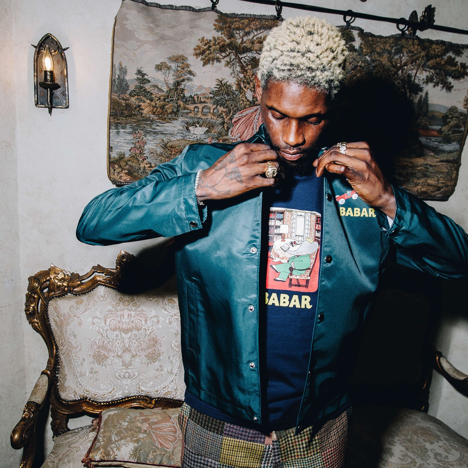 A$AP Nast wearing the green Babar Coach's Jacket.
