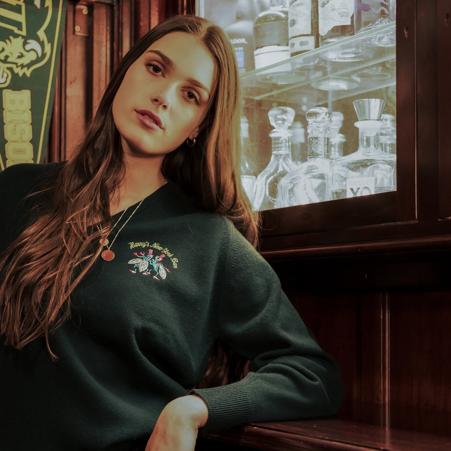 Model wearing the Harry's New York Bar Sweater.