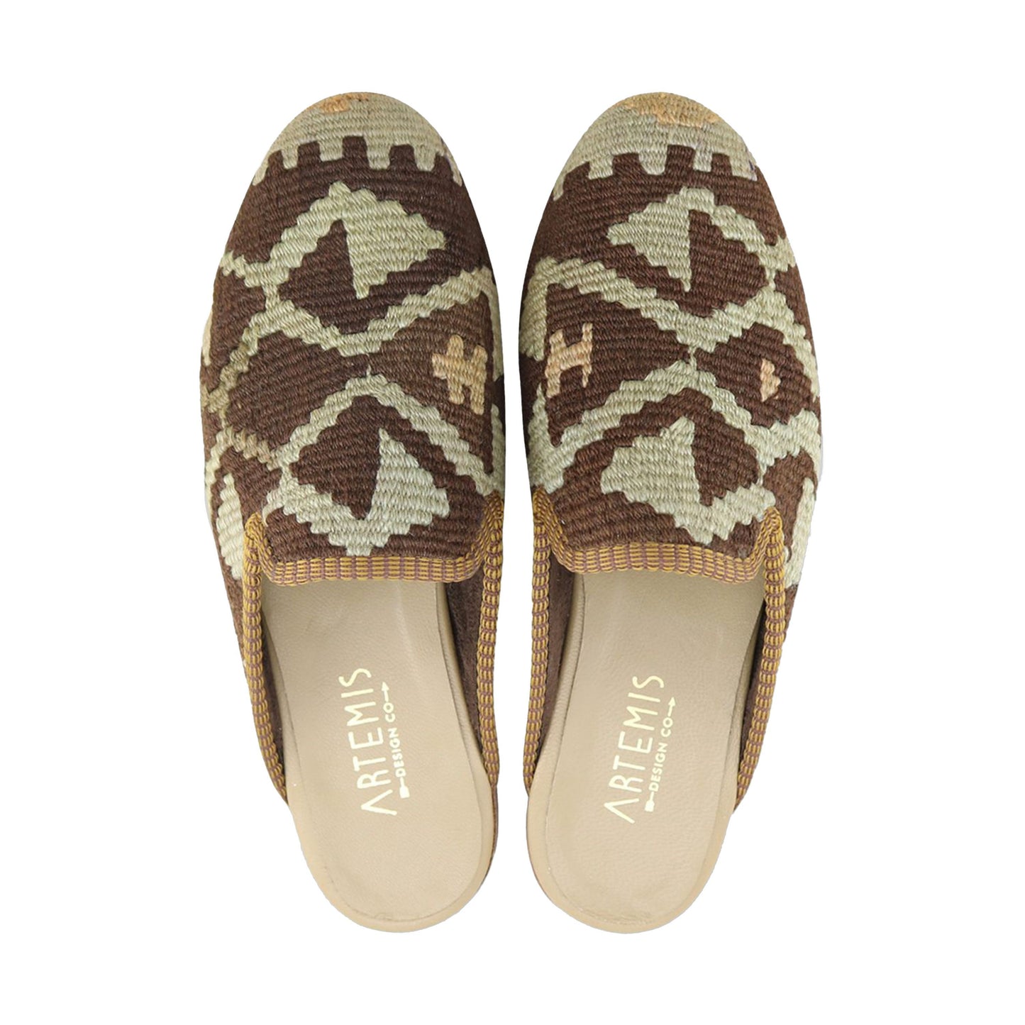 One of a kind slippers handmade from Turkish carpets.