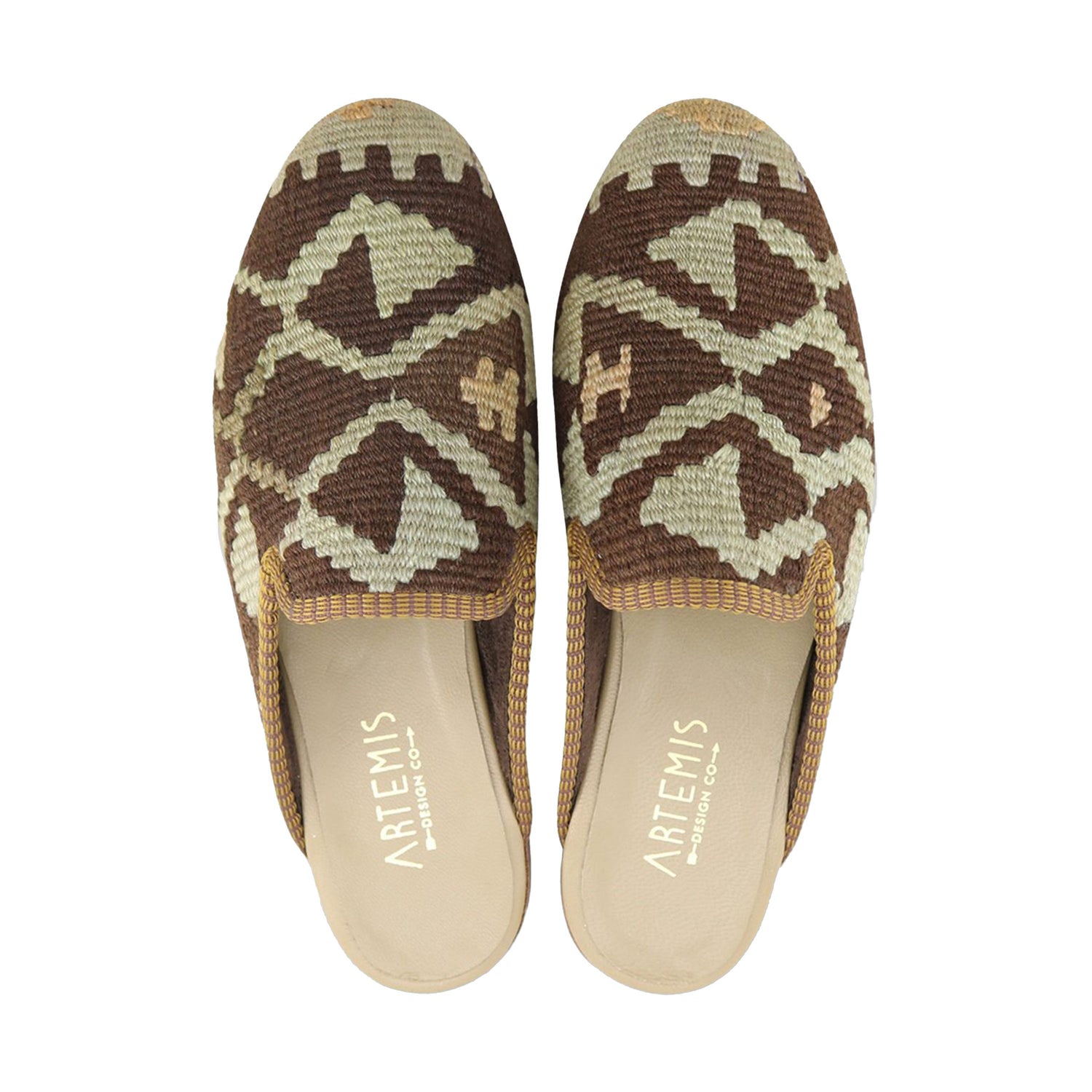 One of a kind slippers handmade from Turkish carpets.