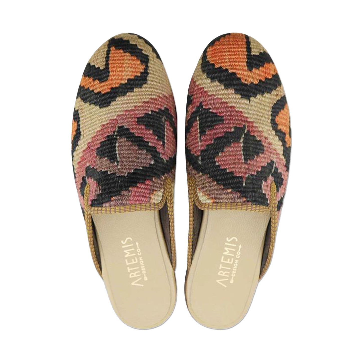 One of a kind slippers handmade from Turkish carpets.