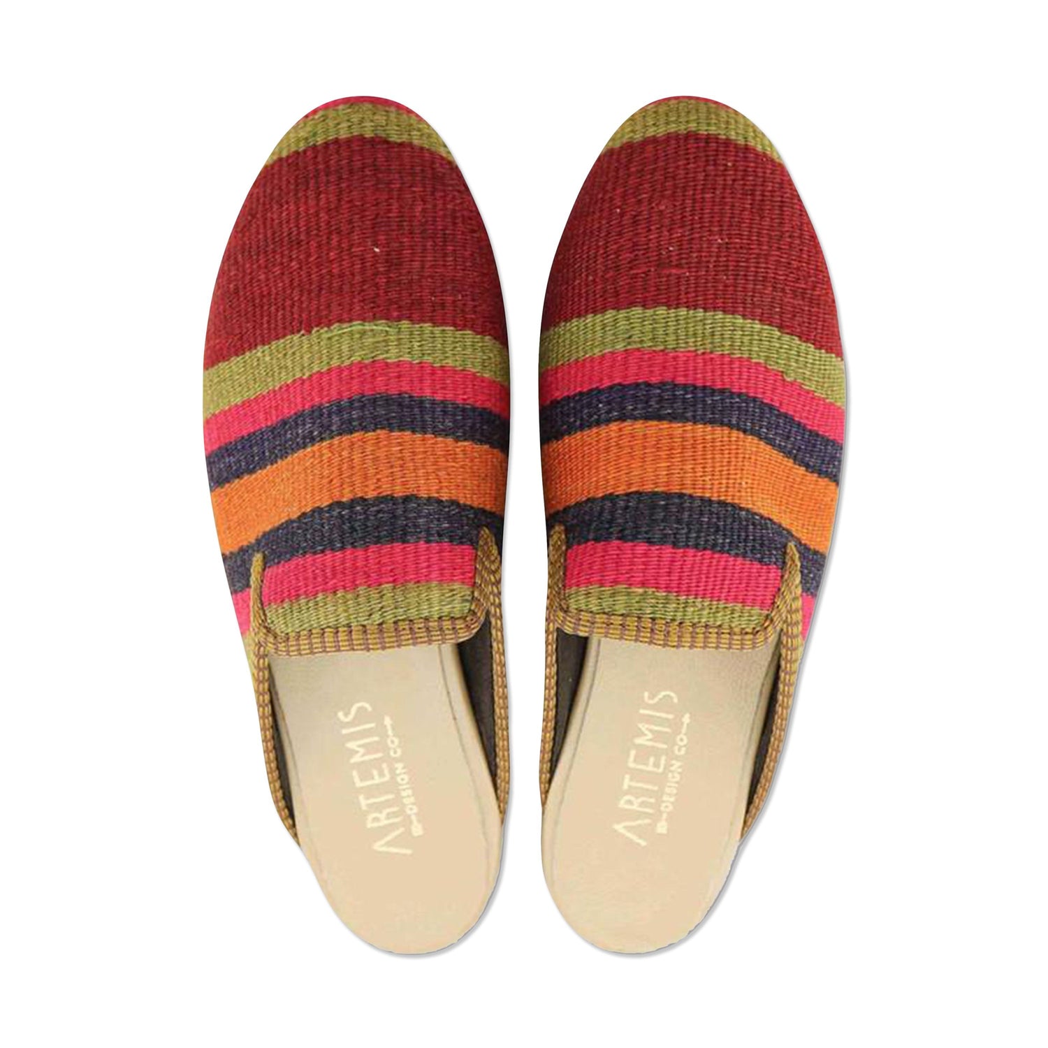 One of a kind slippers handmade from Turkish carpets.