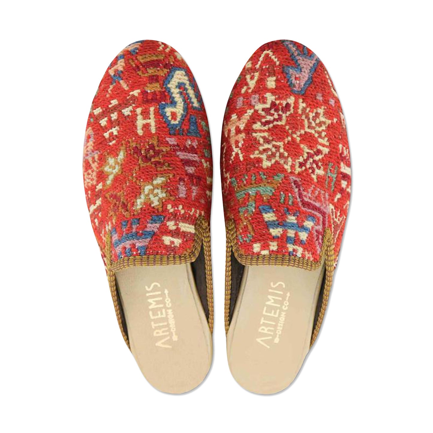 One of a kind slippers handmade from Turkish carpets.