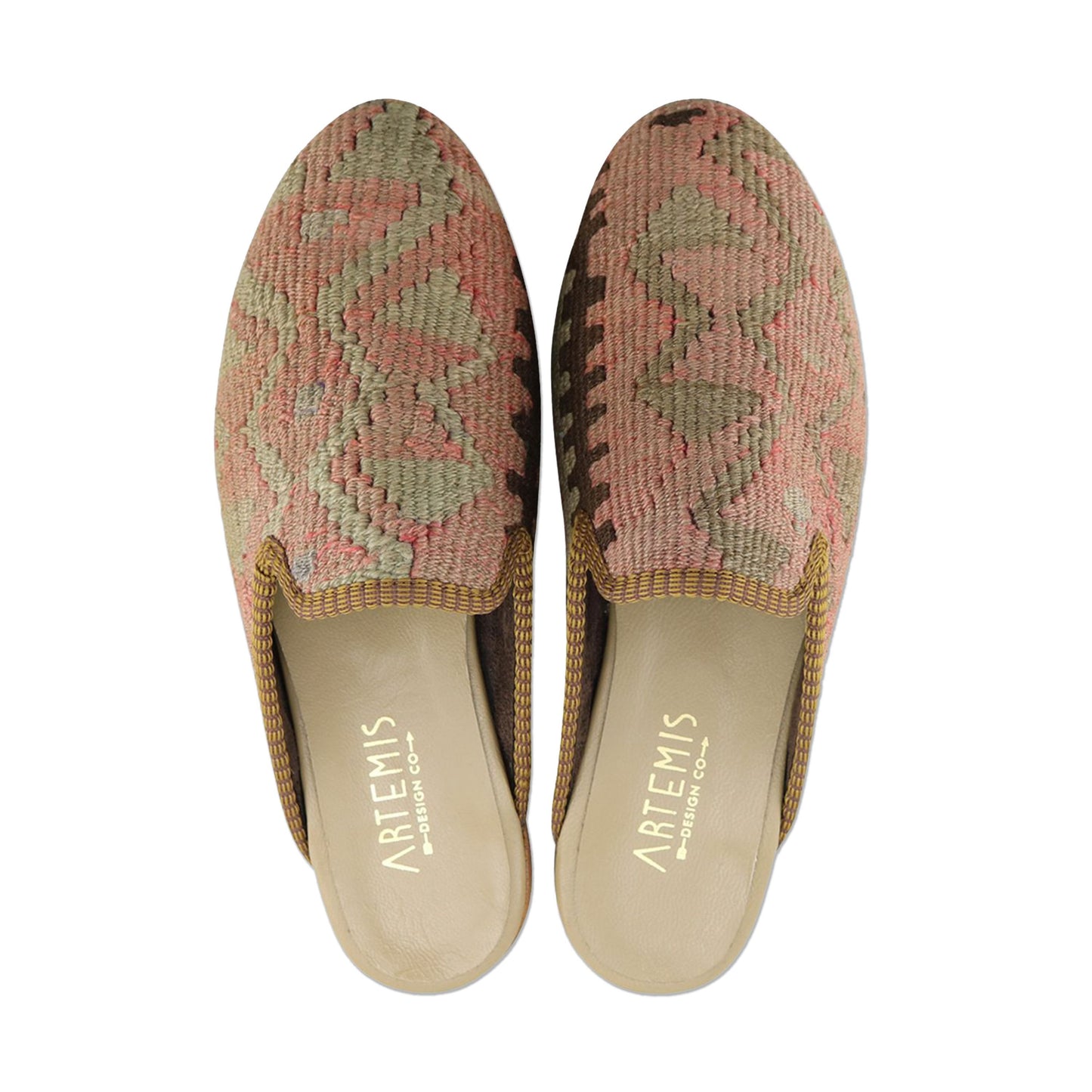 One of a kind slippers handmade from Turkish carpets.