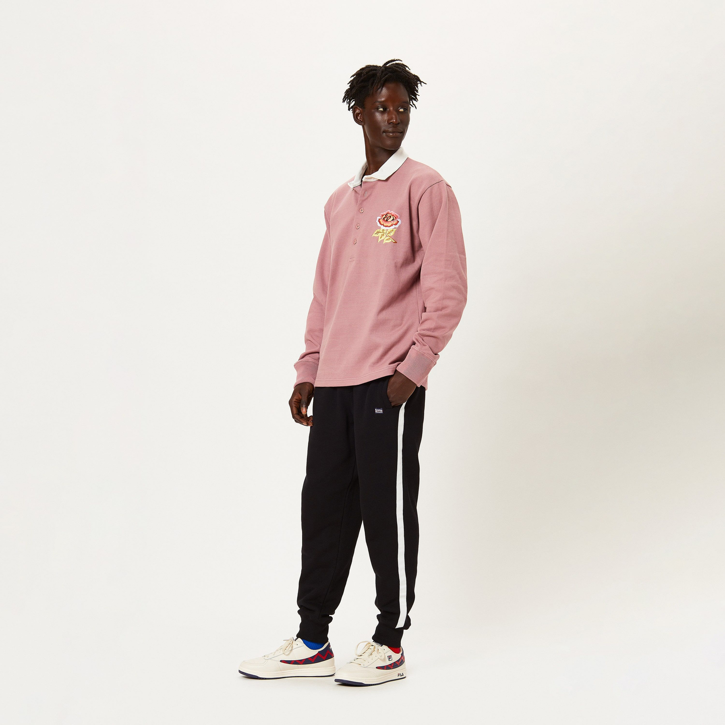 Male model wearing the Dusty Rose Rugby.