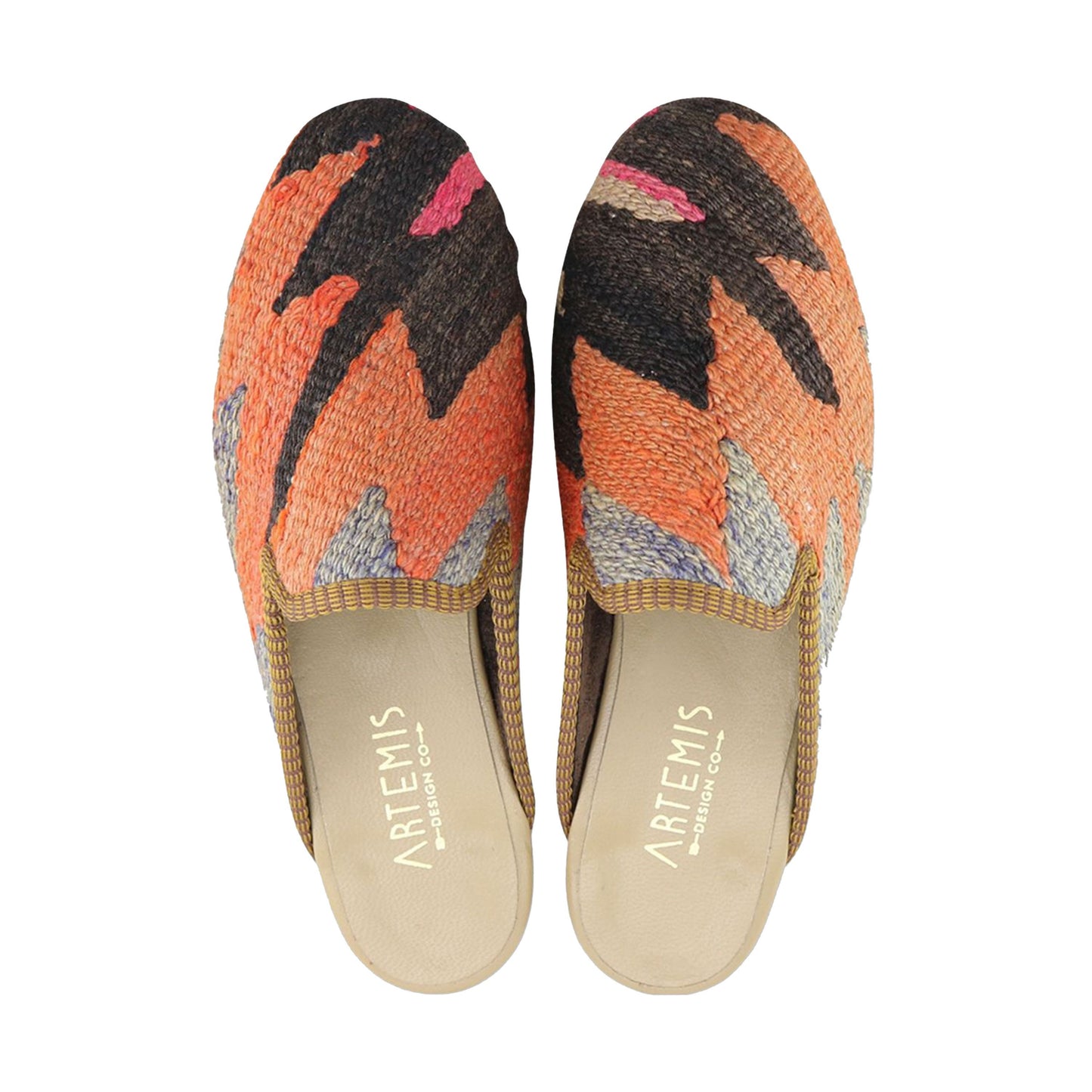 One of a kind slippers handmade from Turkish carpets.