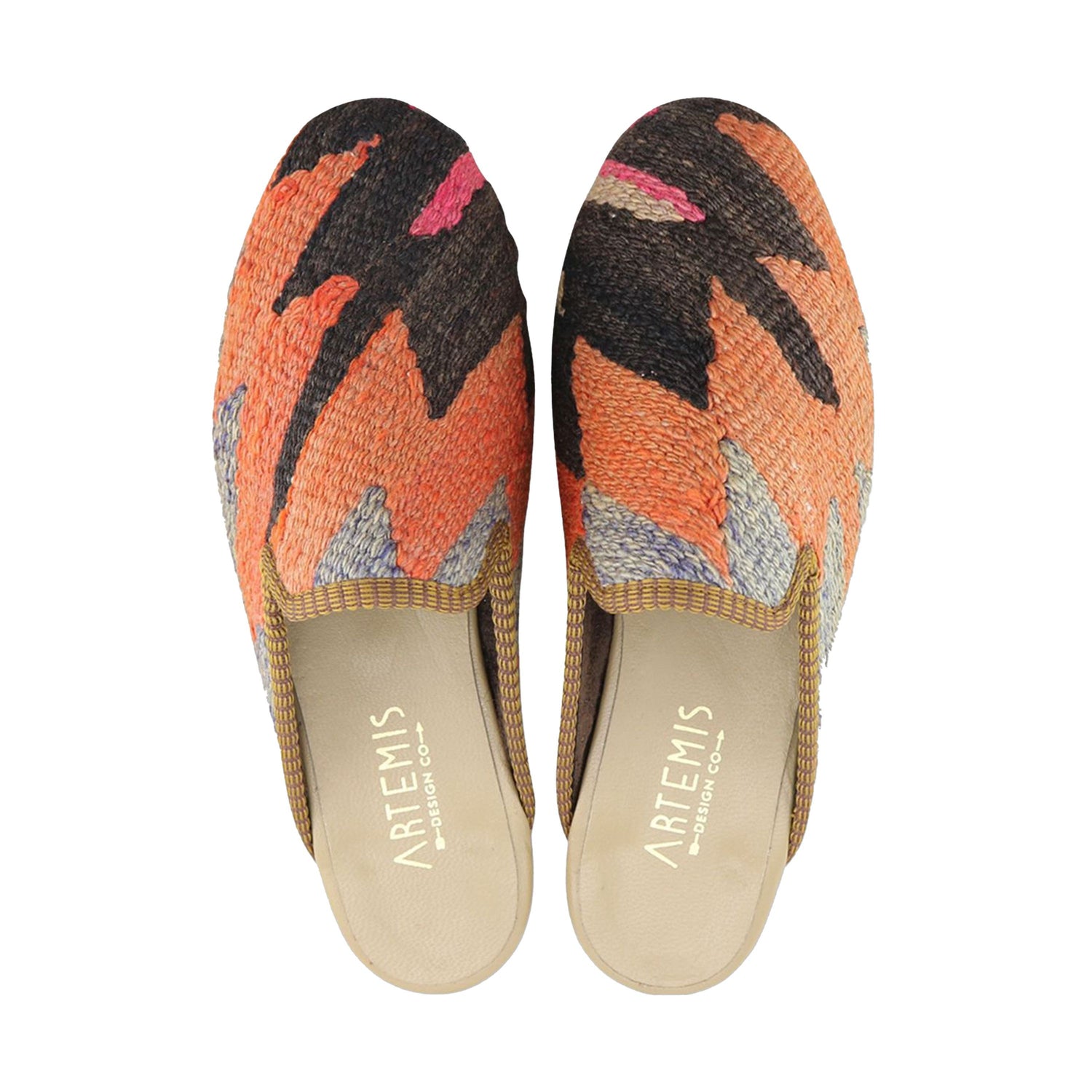 One of a kind slippers handmade from Turkish carpets.