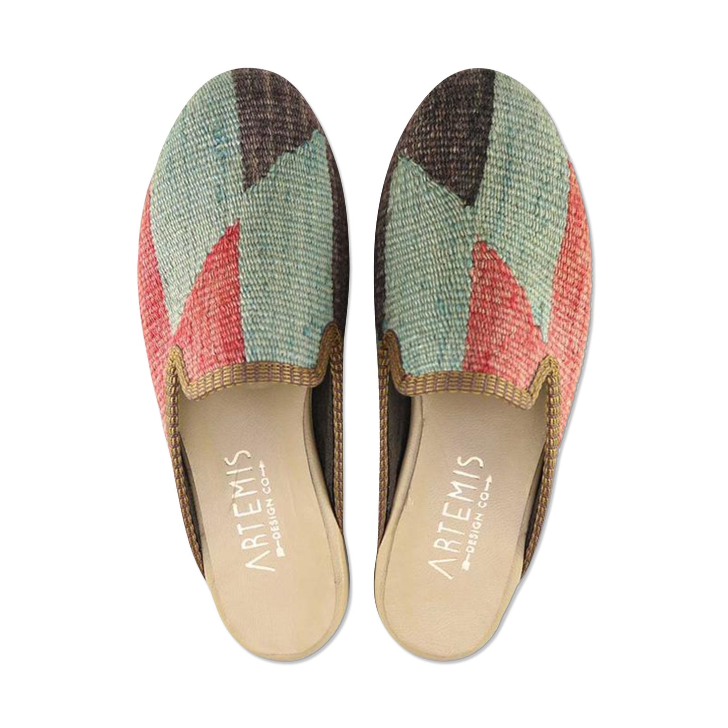 One of a kind slippers handmade from Turkish carpets.