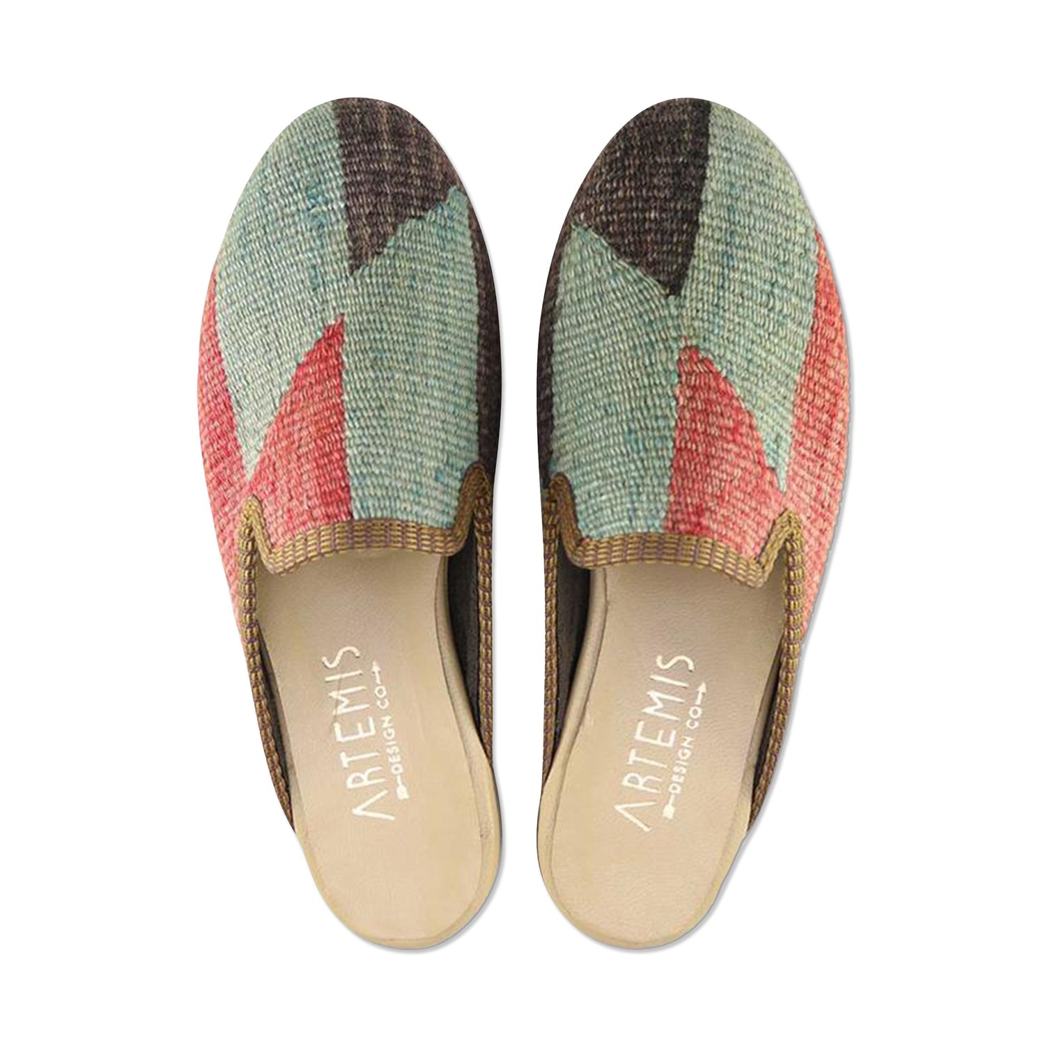 One of a kind slippers handmade from Turkish carpets.