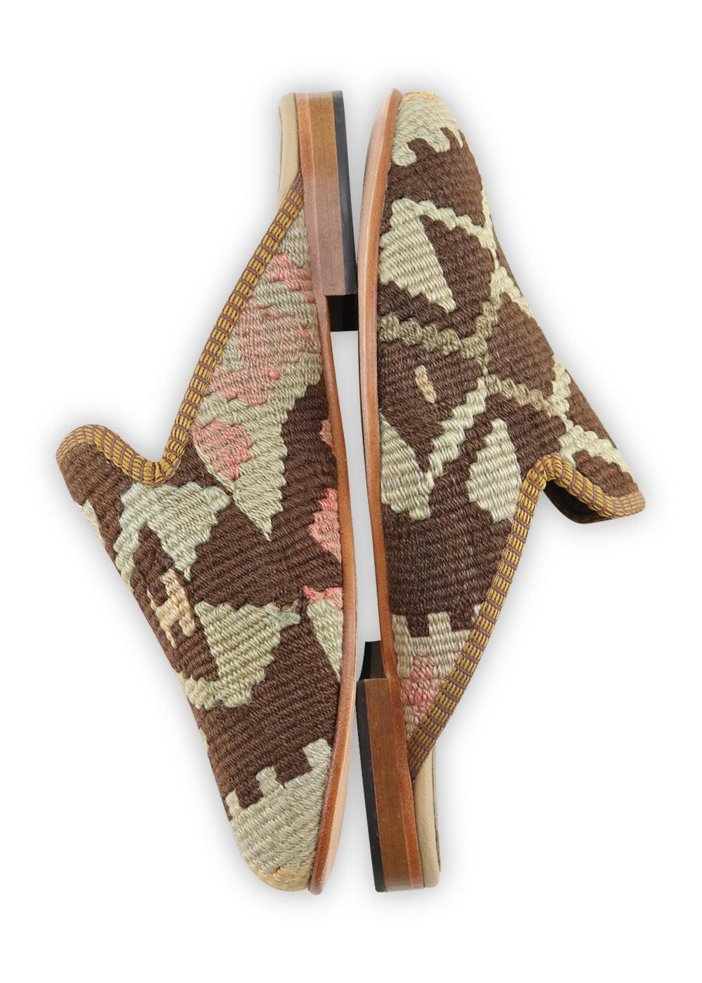 One of a kind slippers handmade from Turkish carpets.