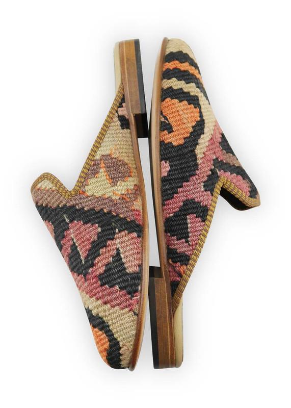 One of a kind slippers handmade from Turkish carpets.