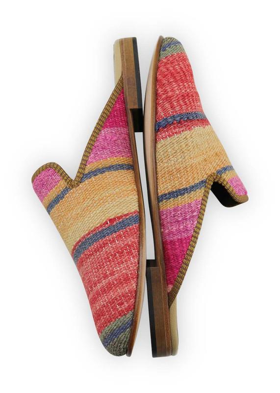 One of a kind slippers handmade from Turkish carpets.