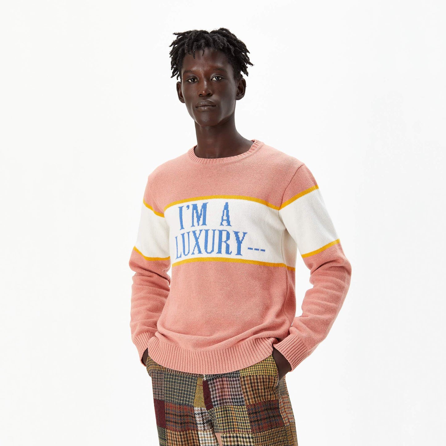 Male model wearing the I'm a Luxury Sweater.