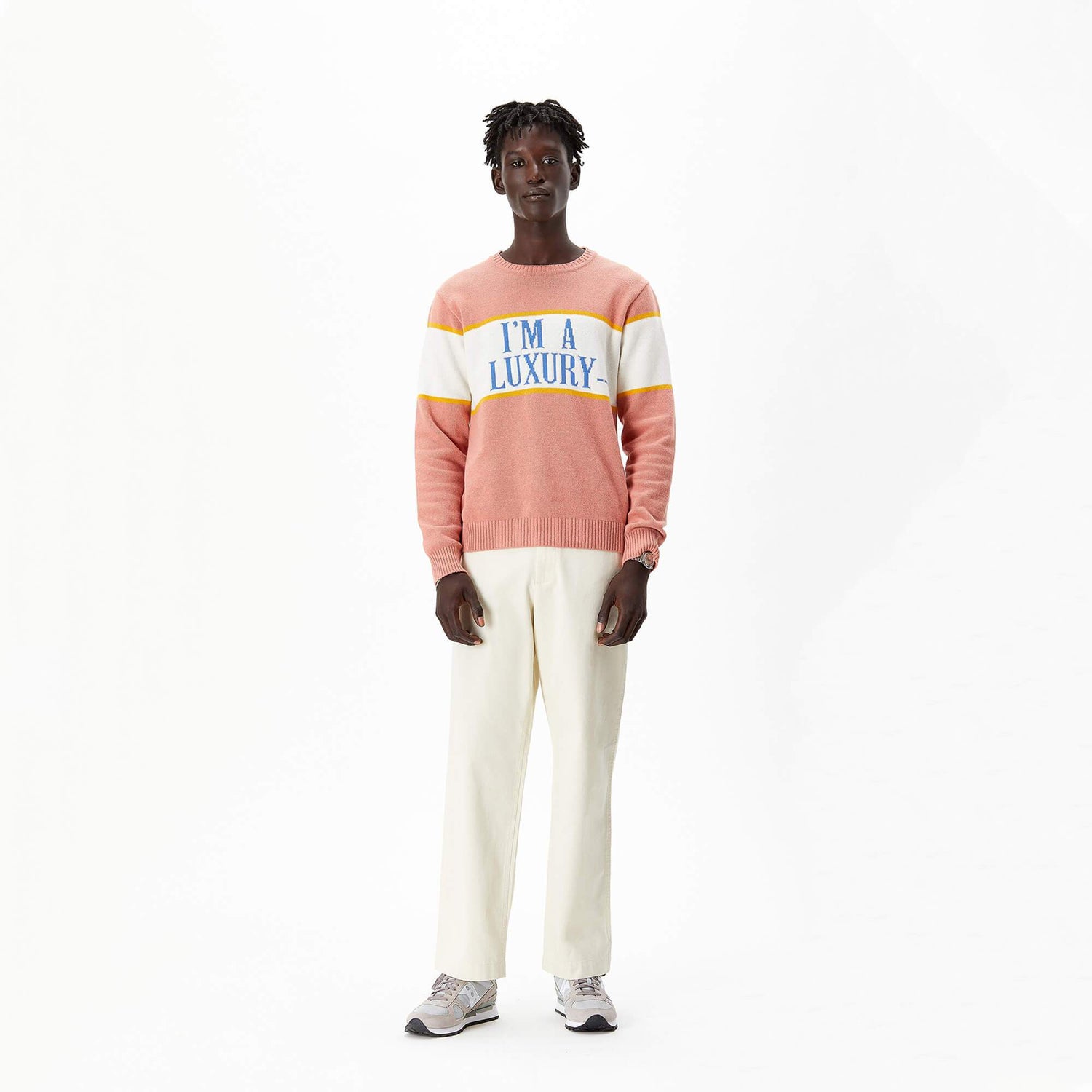 Male model wearing the I'm a Luxury Sweater.