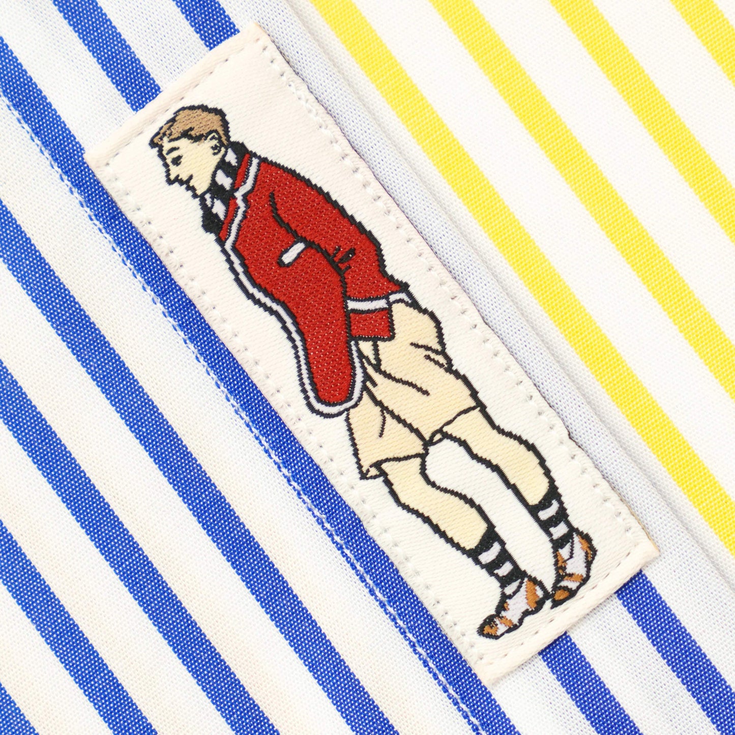 Small "Henry" stitched onto the bottom of the shirt.