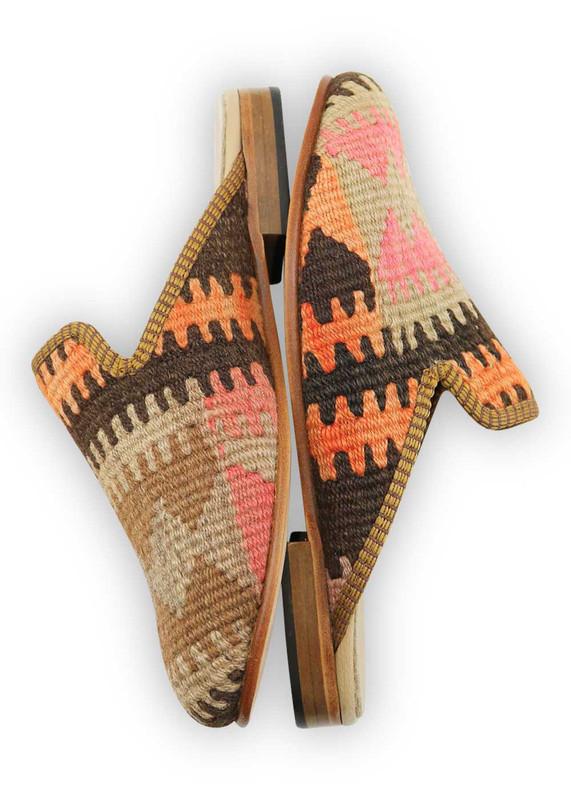 One of a kind slippers handmade from Turkish carpets.