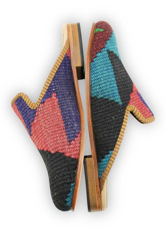 One of a kind slippers handmade from Turkish carpets.