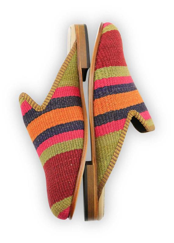 One of a kind slippers handmade from Turkish carpets.