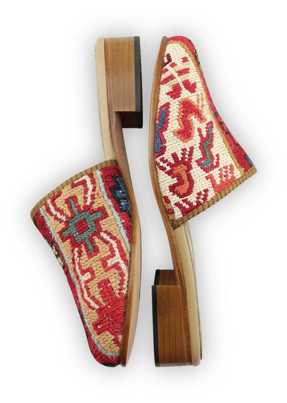 One of a kind slides handmade from Turkish carpets.