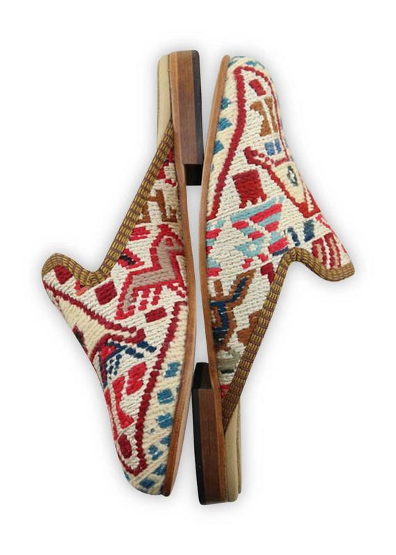 One of a kind slippers handmade from Turkish carpets.