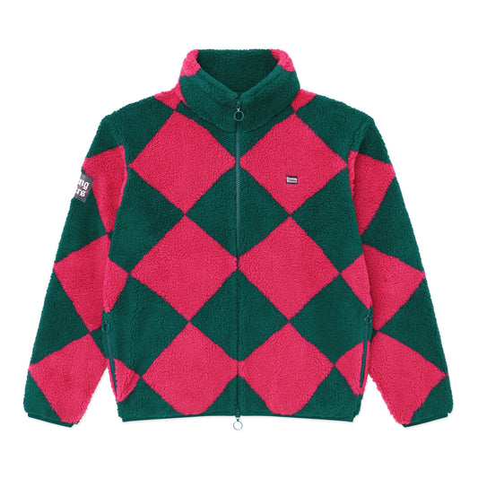 Sherpa fleece in a jockey-inspired, pieced, pink and green harlequin pattern.