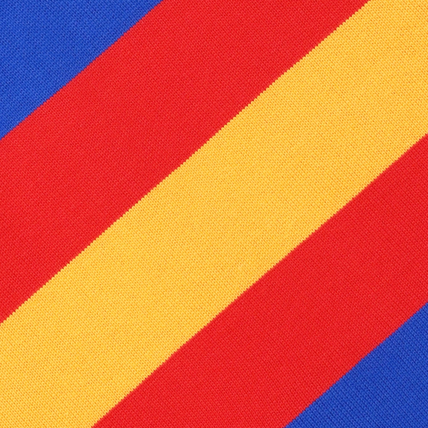 Detail image of blue rugby jersey with red and yellow stripes.