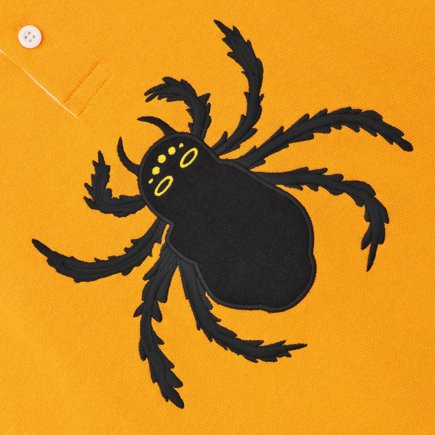 Embroidered black spider.