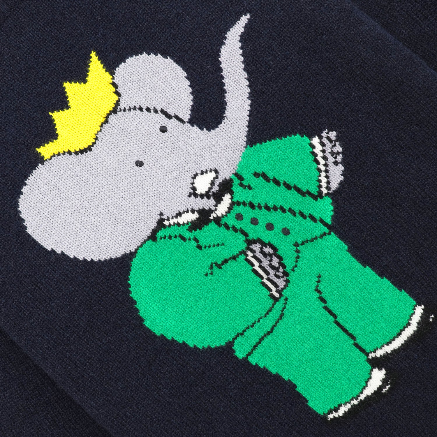 Detail of intarsia depiction of Babar the elephant.