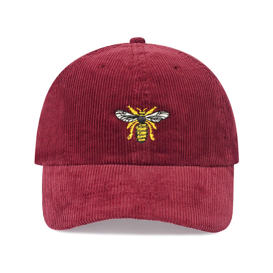 Burgundy corduroy hat with satin-stitched drone bee motif.