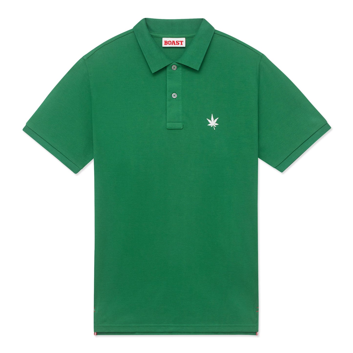 Green polo with white embroidered leaf on the left chest.
