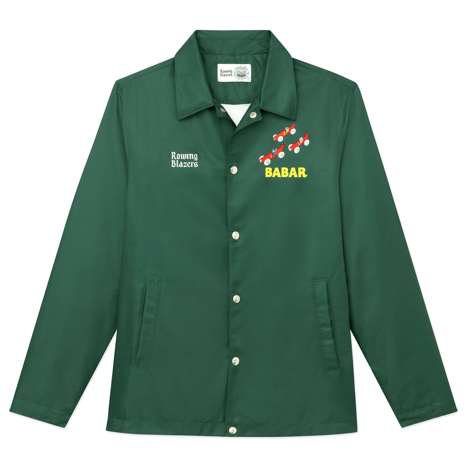 Front of green coach's jacket with printed Babar car motif.