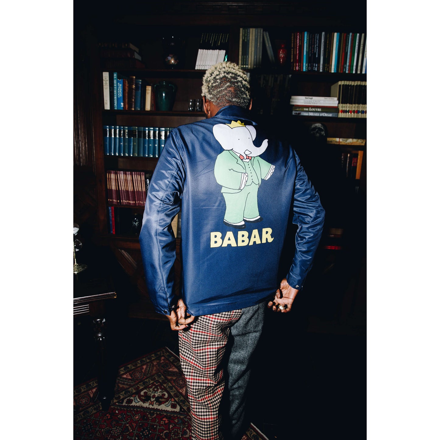 A$AP Nast wearing the navy Babar Coach's Jacket.