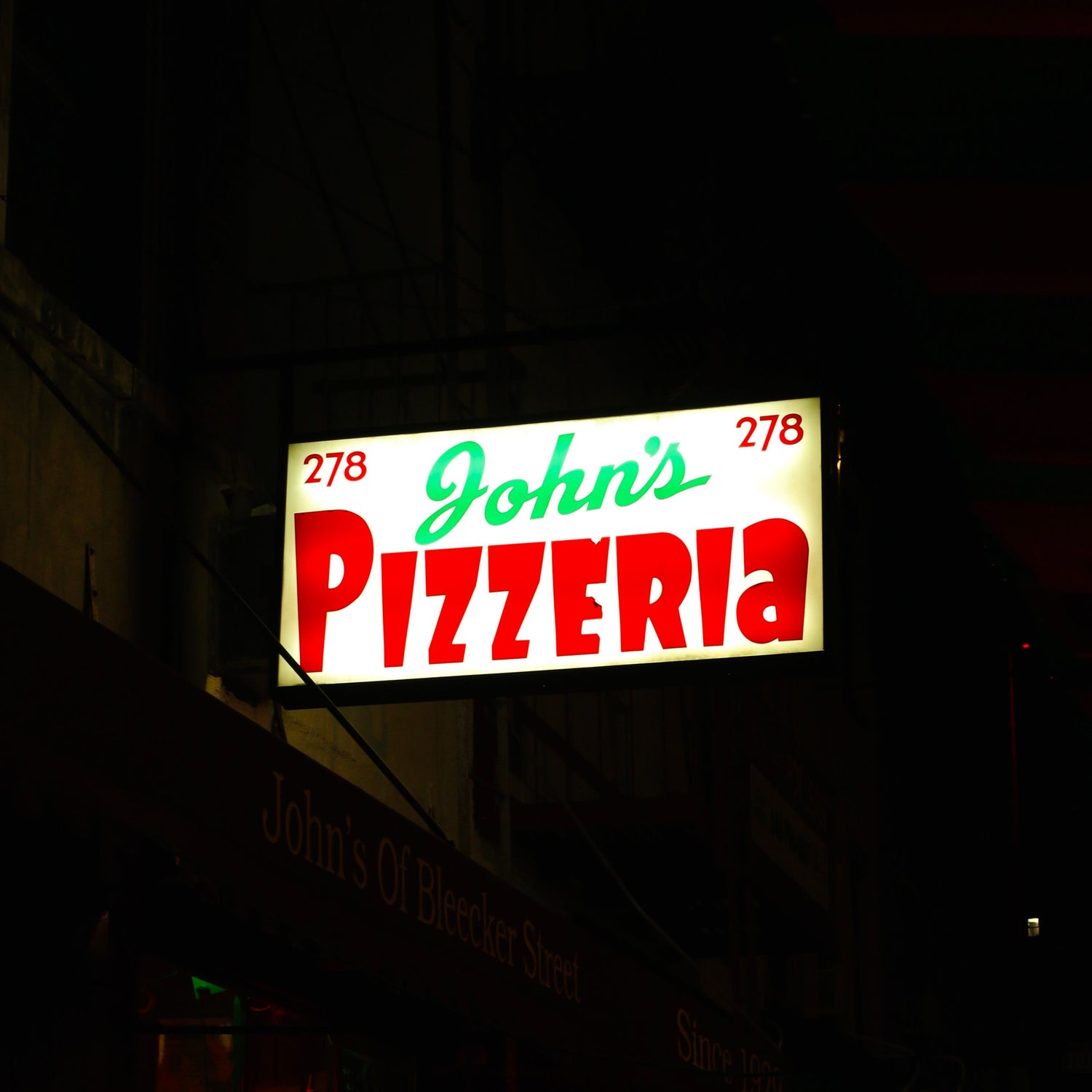 John's Pizzeria sign outside of the restaurant