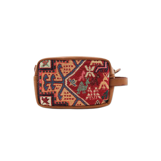 One of a kind dopp kit handmade from Turkish carpets with leather handle.