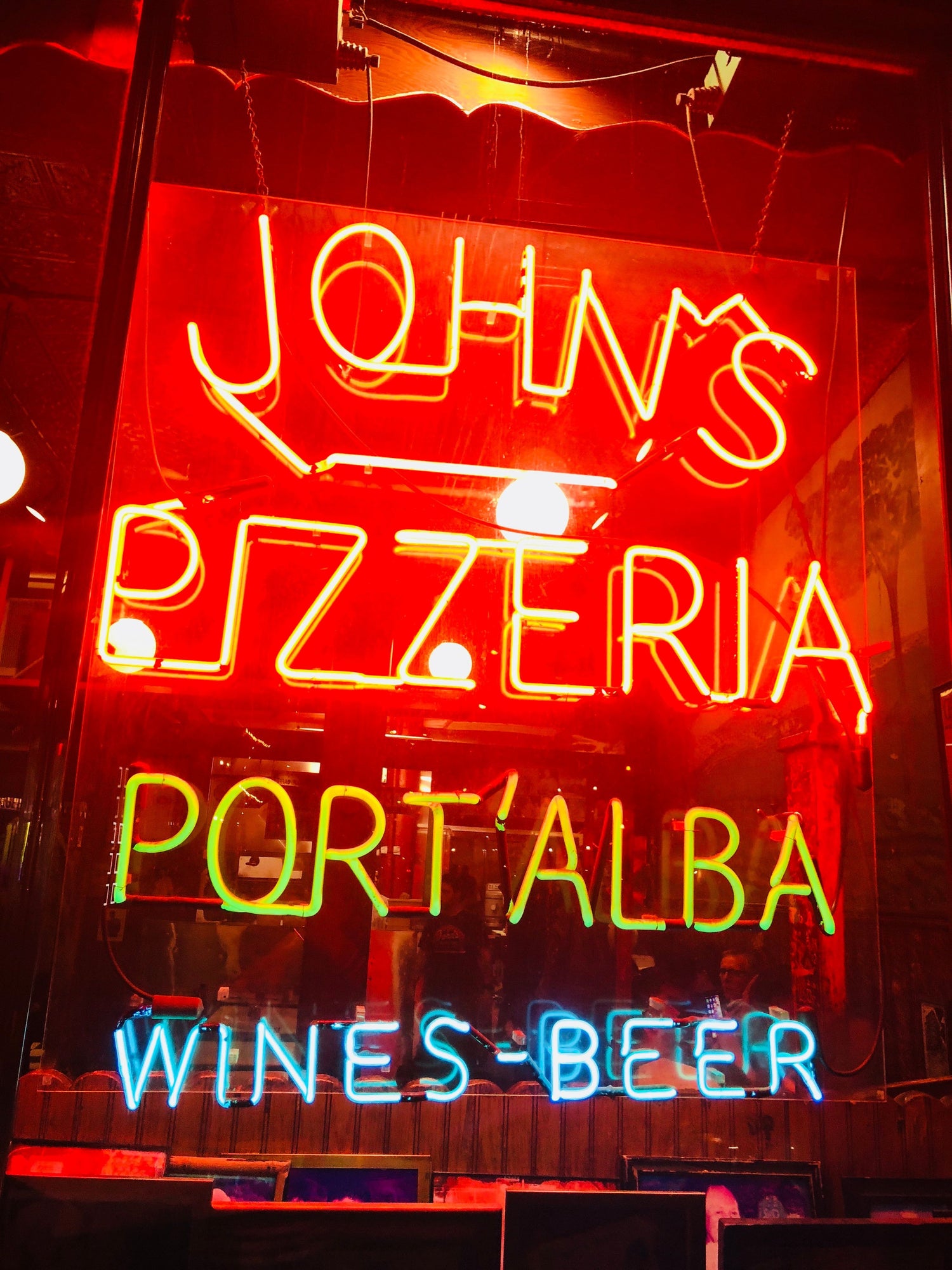 John's Pizzeria sign outside of the restaurant