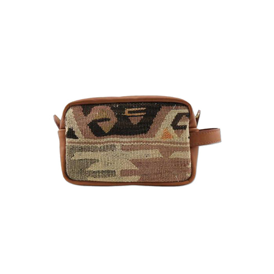 One of a kind dopp kit handmade from Turkish carpets with leather handle.