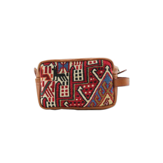 One of a kind dopp kit handmade from Turkish carpets with leather handle.