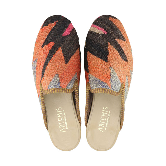 One of a kind slippers handmade from Turkish carpets.