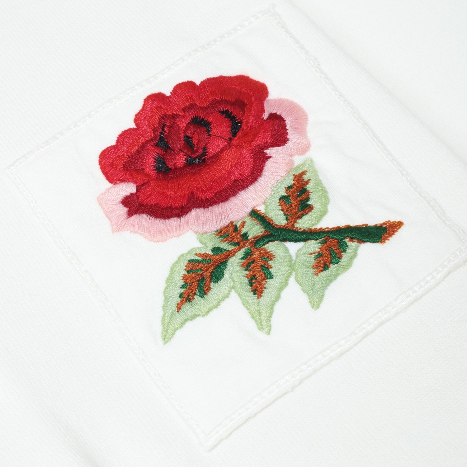Embroidered rose patch.