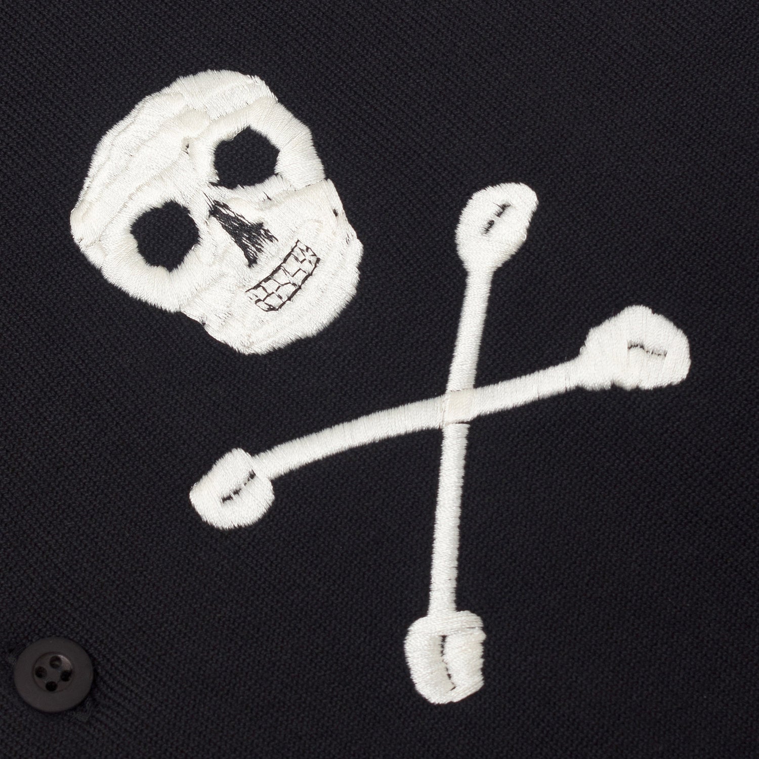 Embroidered skull and crossbones.
