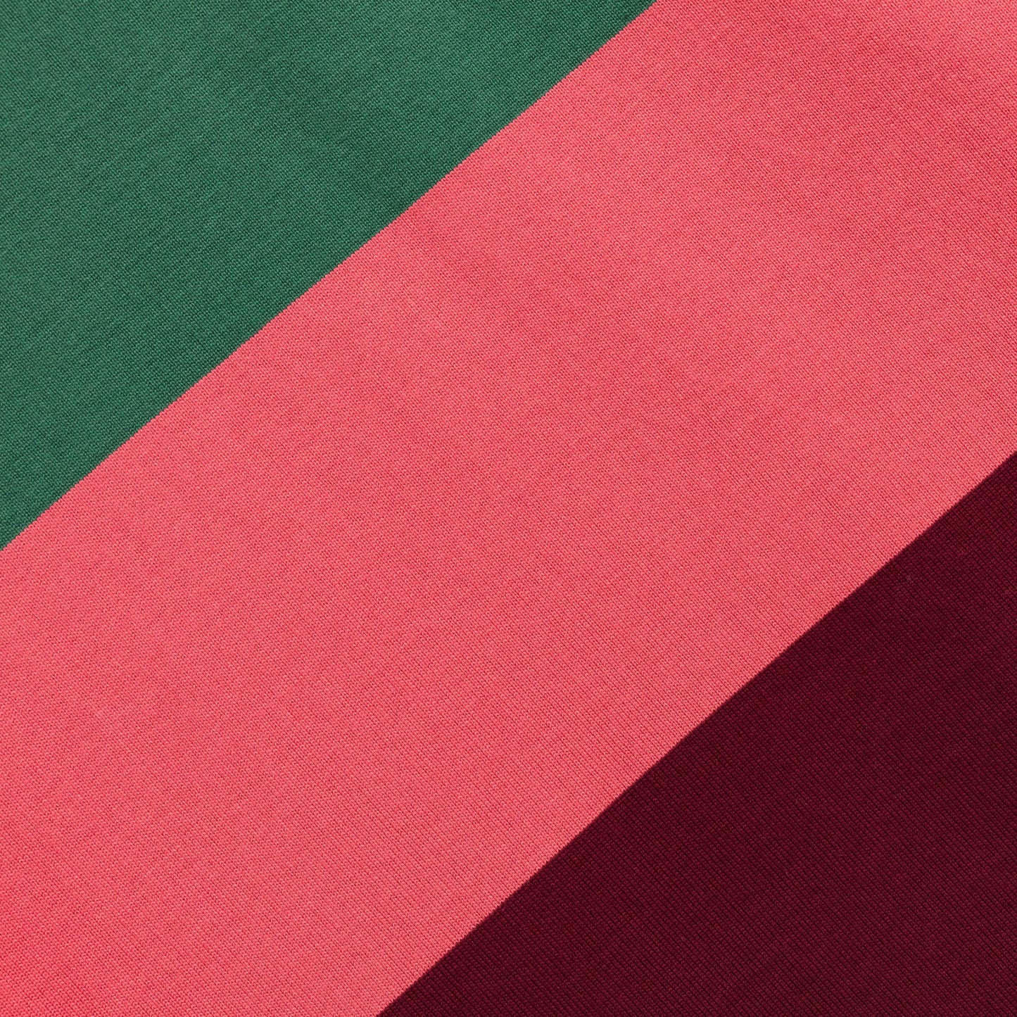Detail of burgundy, pink and green stripes.